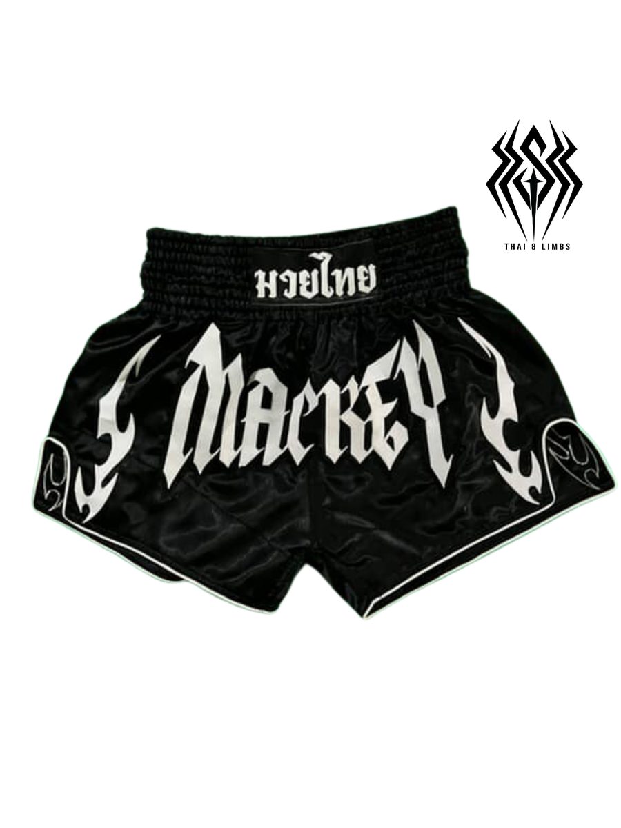 กางเกงมวยไทยสั่งตัด สีดำ ปักชื่อ MACKEY ลายเปลวไฟ ขอบเอวปักคำว่ามวยไทย
